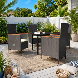 Black Steel and Rattan 5 Piece Outdoor Dining Set