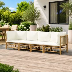 4 Piece Brown Bamboo Lounge Set for Outdoor Relaxation with Cream Cushions
