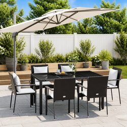 Durable 7 Piece Outdoor Dining Set with Cushions in Black