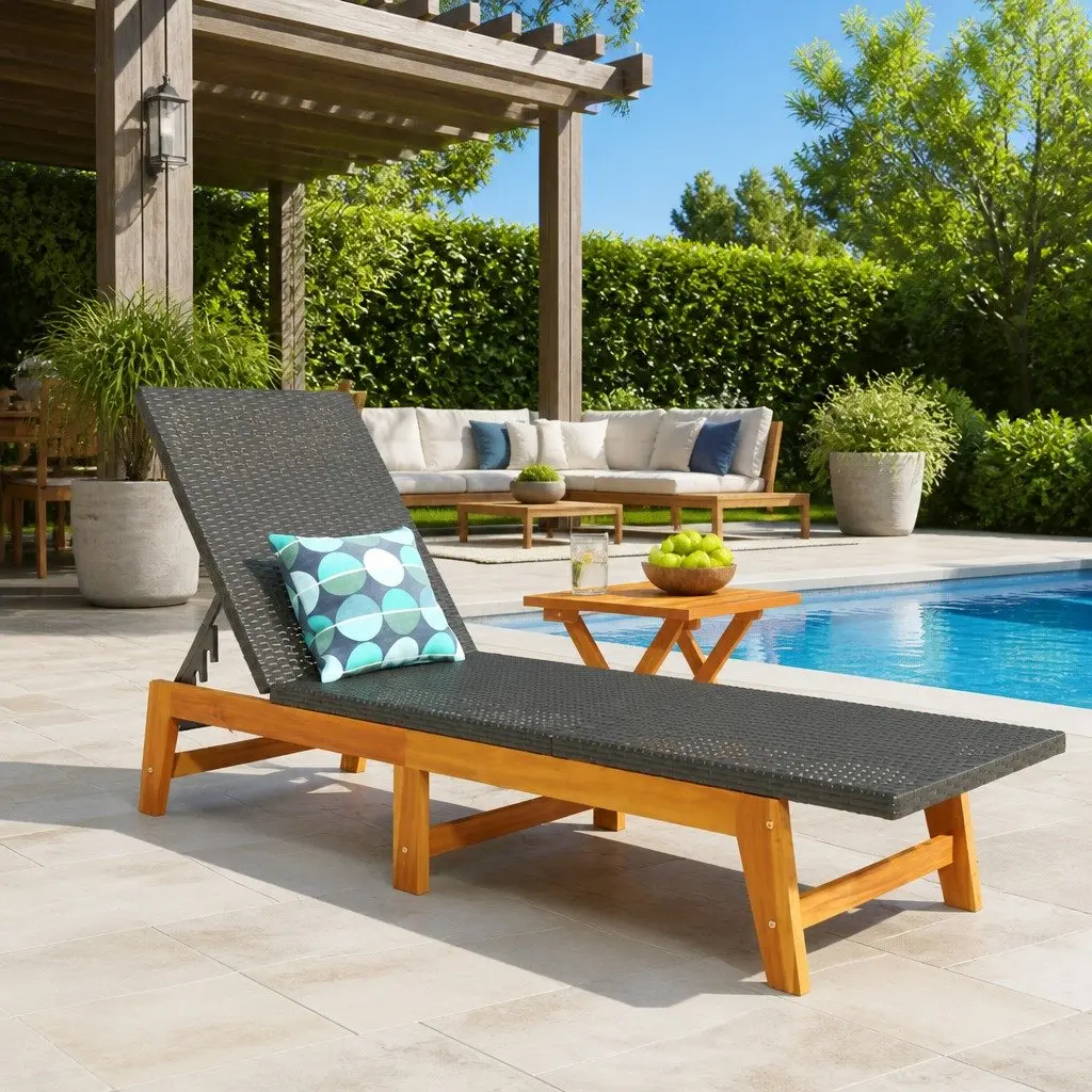 Black Sun Lounger with Integrated Side Table for Outdoor Relaxation