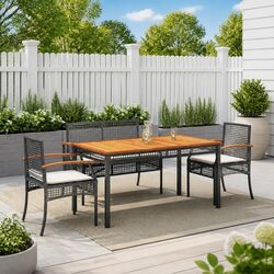 Durable 4 Piece Outdoor Dining Set in Black Poly Rattan