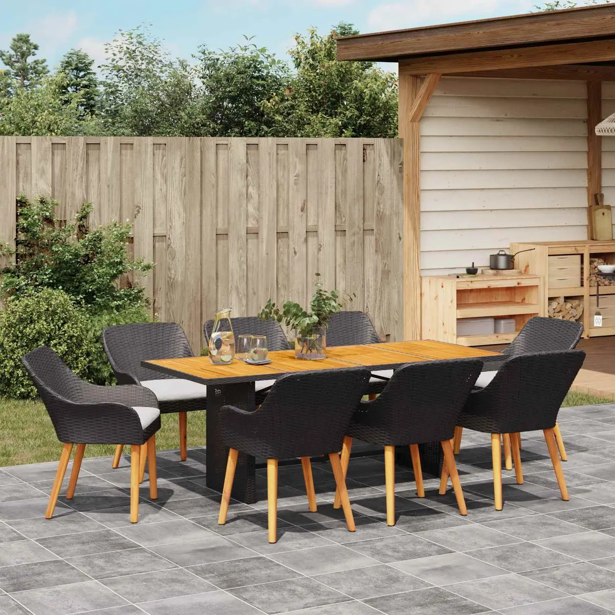 9-Piece Garden Dining Set in Black Poly Rattan