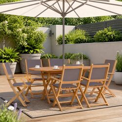Durable 7 Piece Garden Dining Set with Foldable Design