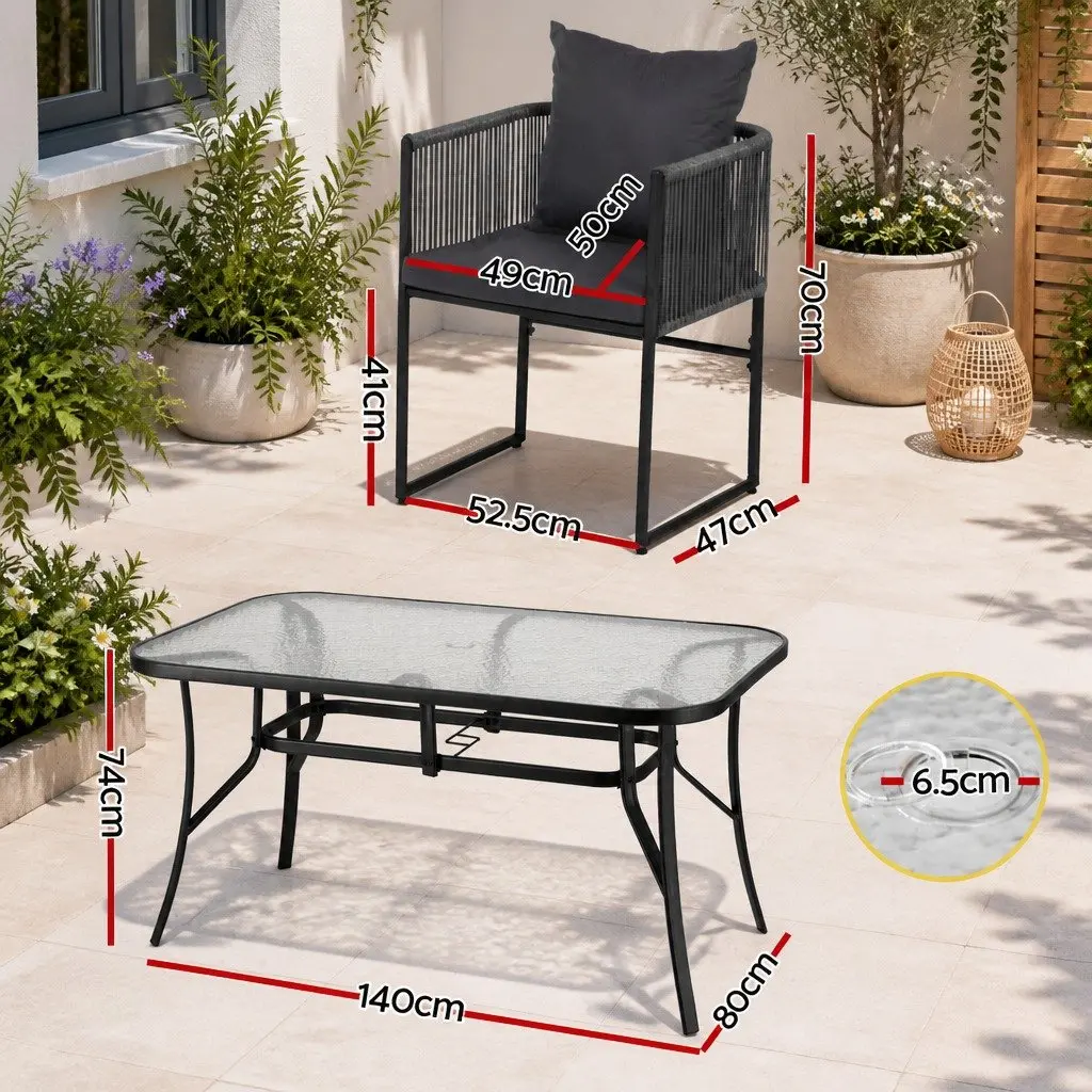 5 Piece Outdoor Dining Set Tempered Glass Black Table with Parasol Hole and Stackable Chairs Weather Resistant Synthetic Fabric