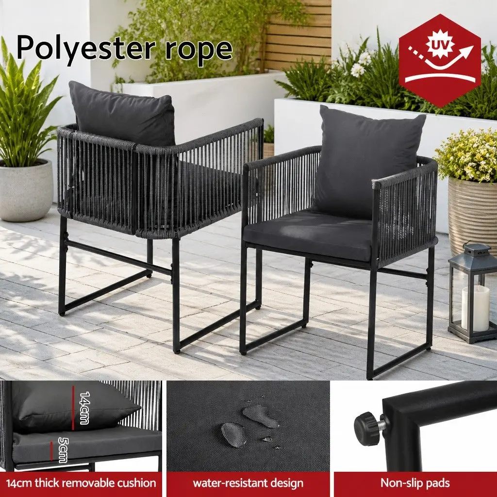 5 Piece Outdoor Dining Set Tempered Glass Black Table with Parasol Hole and Stackable Chairs Weather Resistant Synthetic Fabric